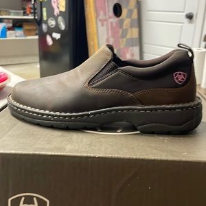 Woman’s size 10 slip on rubber soled shoes. Brand new never worn.